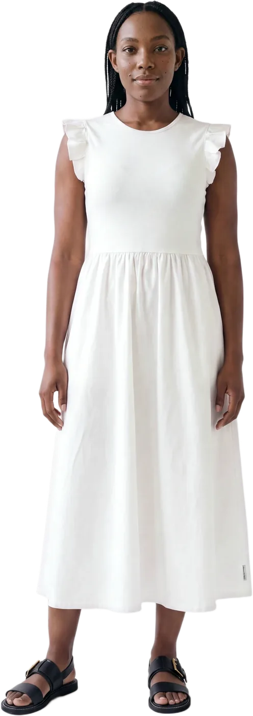 A model in a white midi dress, full length